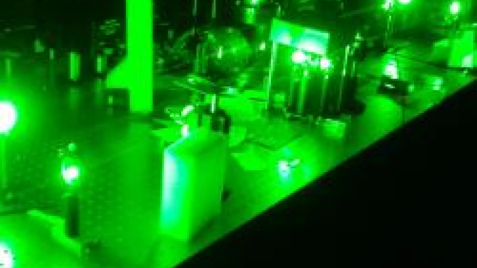 GRAY laser setup illuminated by green laser scatter